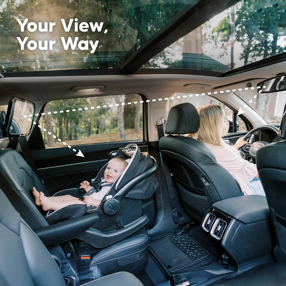 Baby in a car seat visible through the Mom&Baby™ Baby Car Rearview Mirror securely attached to a car headrest. Provides a wide-angle, clear view for safe driving.