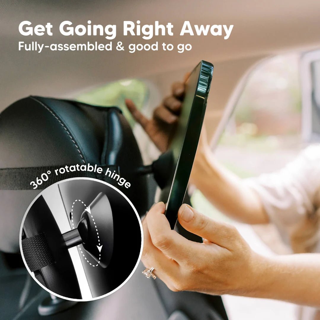 Baby in a car seat visible through the Mom&Baby™ Baby Car Rearview Mirror securely attached to a car headrest. Provides a wide-angle, clear view for safe driving.