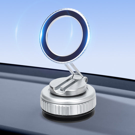Magnetic phone mount with vacuum suction base and 360° rotation — silver and gunmetal colors on dashboard"