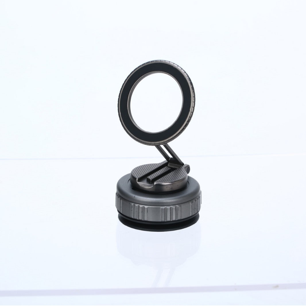 Magnetic phone mount with vacuum suction base and 360° rotation — silver and gunmetal colors on dashboard"