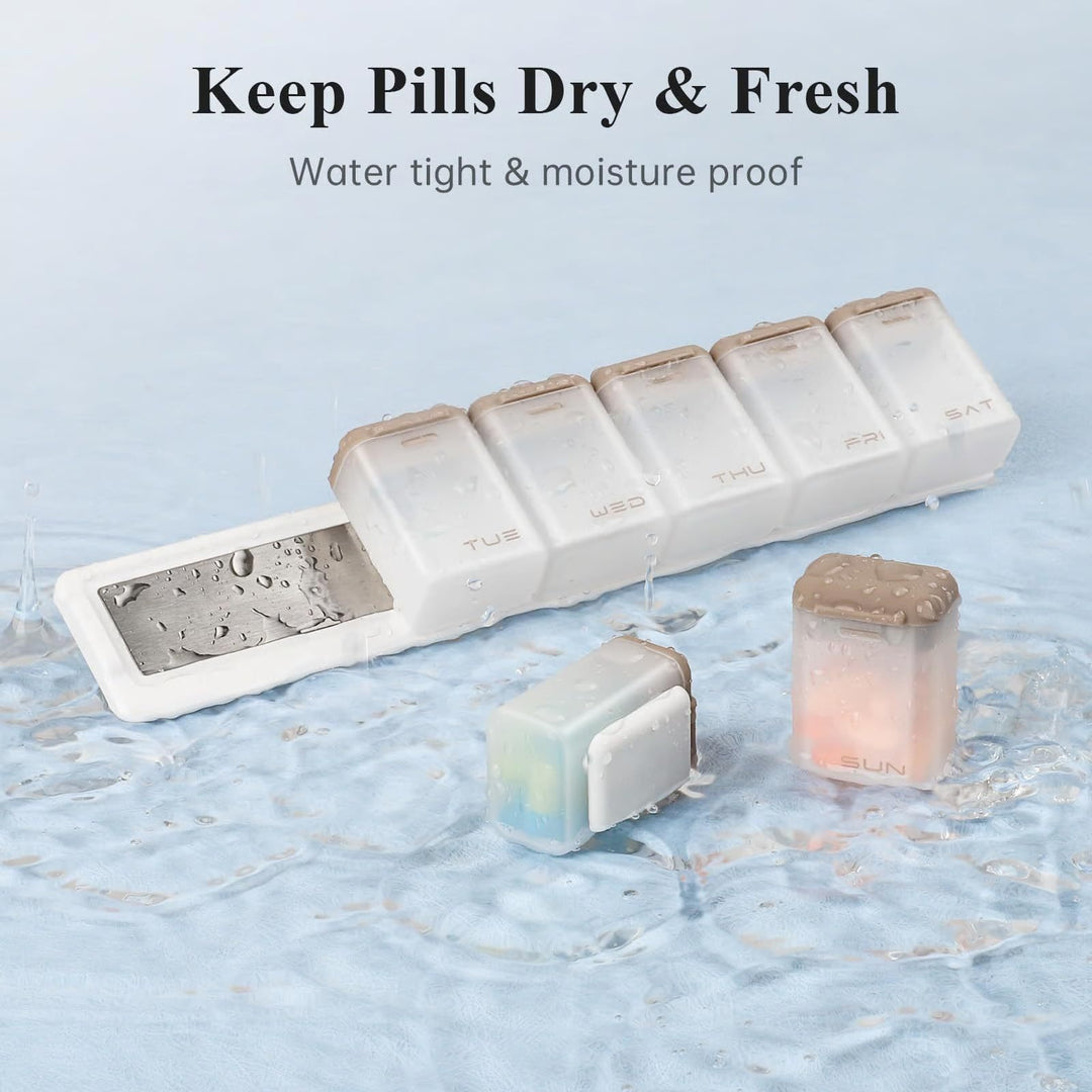 7-day magnetic pill organizer with large labeled compartments for vitamins, supplements, and capsules, shown with measurements and daily labels from SUN to SAT.
