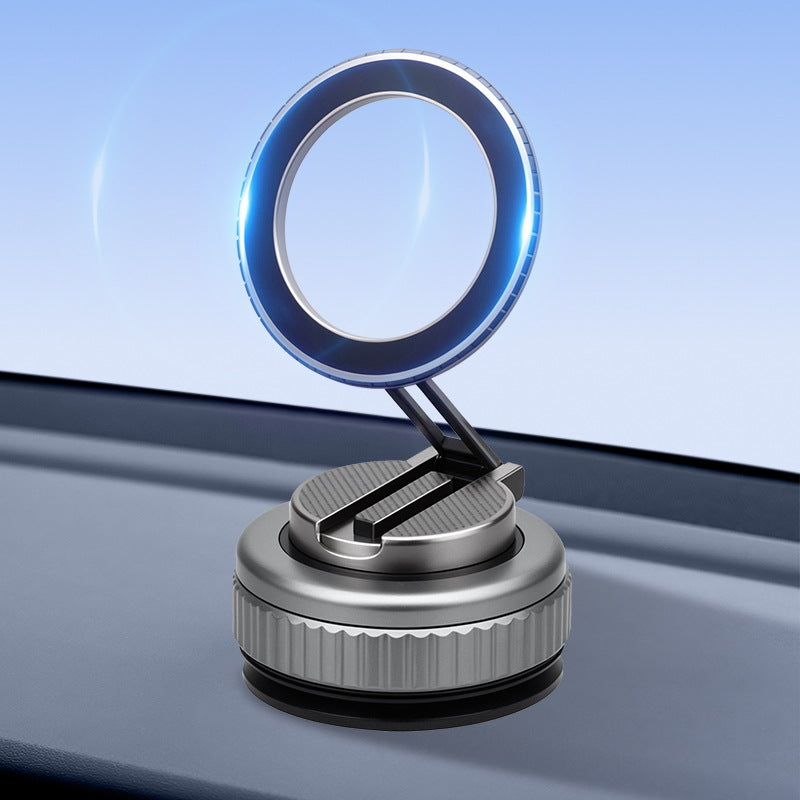 Magnetic phone mount with vacuum suction base and 360° rotation — silver and gunmetal colors on dashboard"